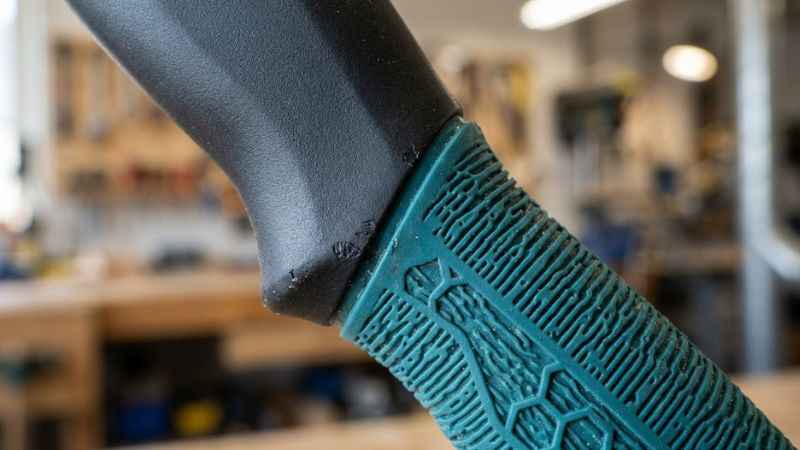 Soft TPE thermoplastic elastomer material molded onto a tool handle grip.